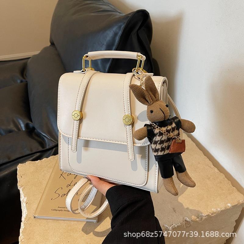 Niche high-end retro buckle backpack 2025 new crossbody British commuter student three types of backpack