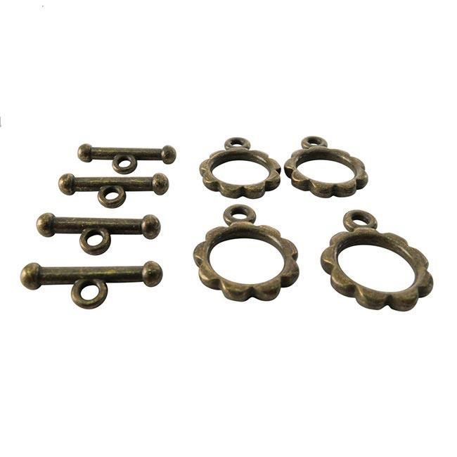 Lot de 4 fermoirs anneaux avec bâtonnets formes fleurs couleur bronze