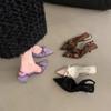 Niche high heels leopard print bag head sandals fairy shoes 2025 new spring and summer pointed bow single shoes