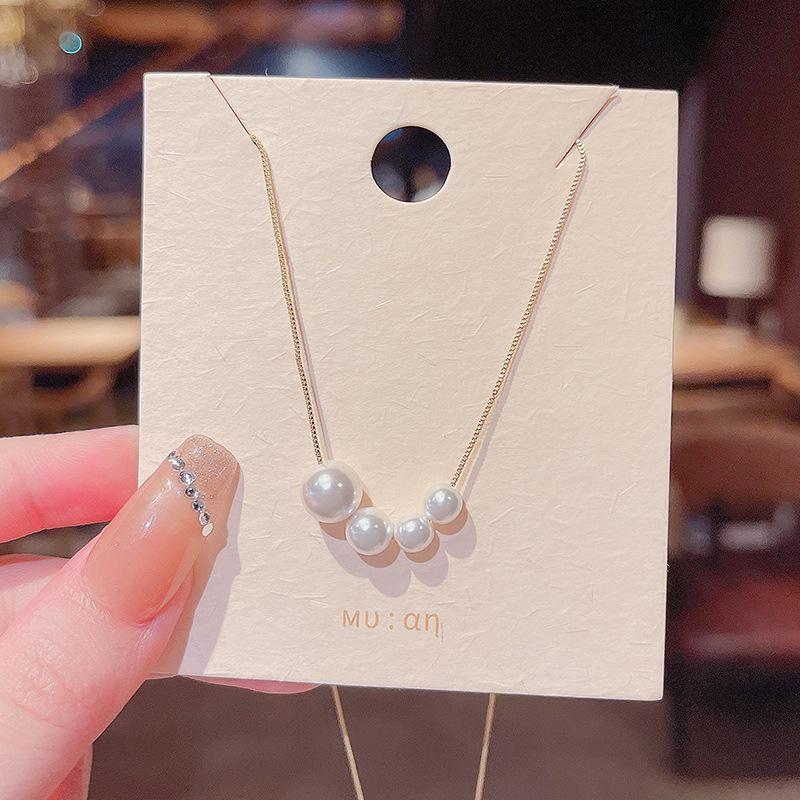 „Trendový špičkový perlový náhrdelník: Všestranný klíční řetízek z titanové oceli pro ženy"