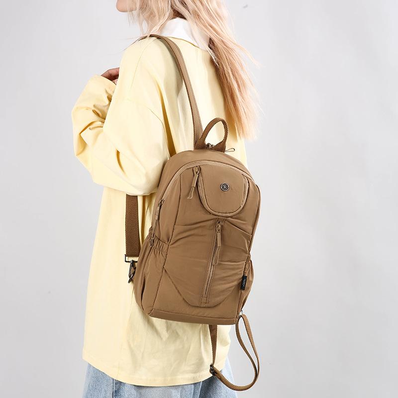 Schoolbag Large capacity breast bag Multifunctional small backpack Short trip bag Women's new solid color small backpack Fashion women's backpack