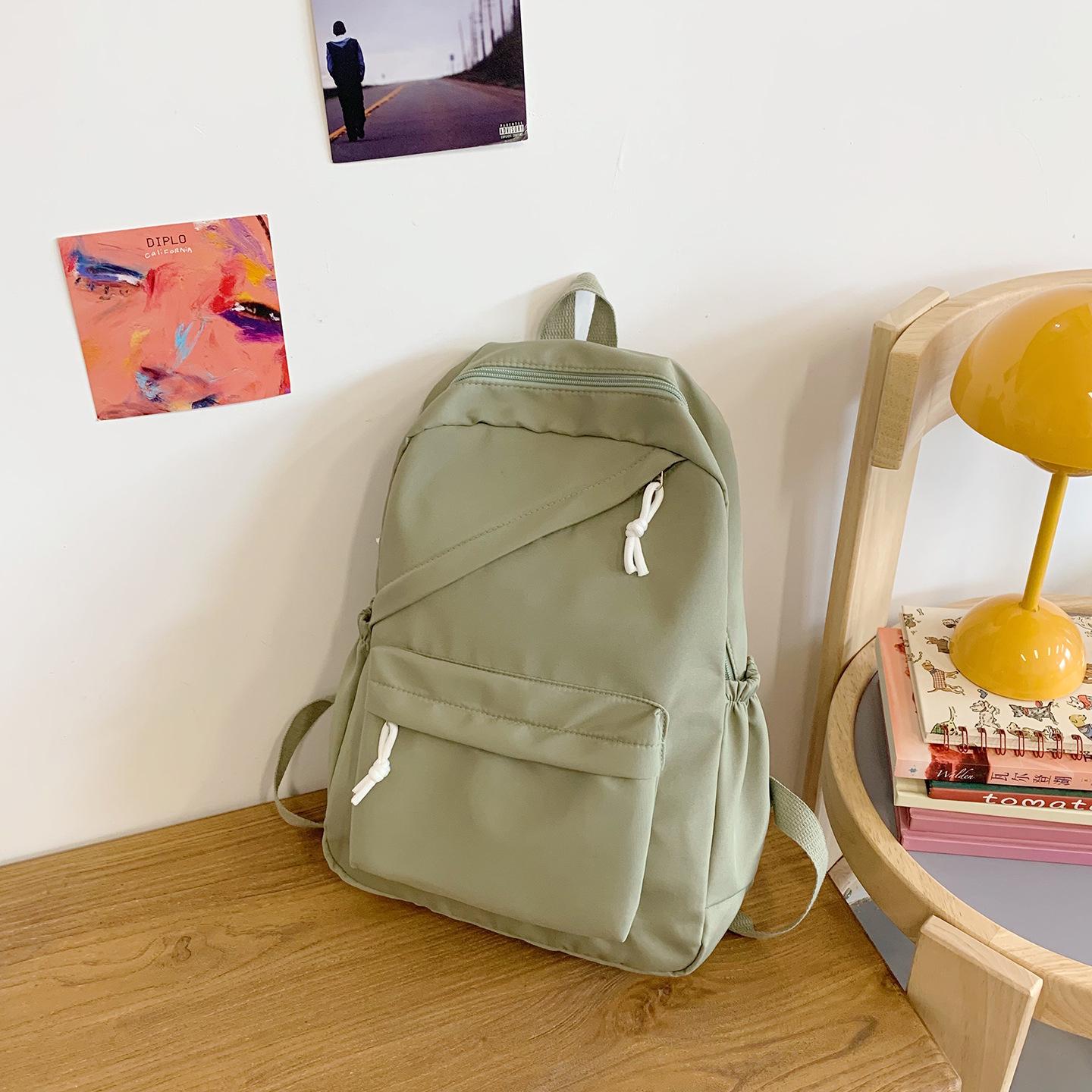 

Korean version of the new small fresh backpack high value campus junior high school student schoolbag trend large capacity travel backpack