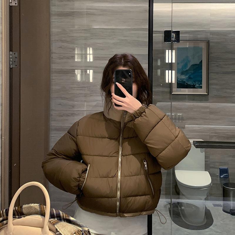 

Носите пуховик с обеих сторон, женский, в цветовой гамме, со стойкой, короткий. XL темно-коричневого