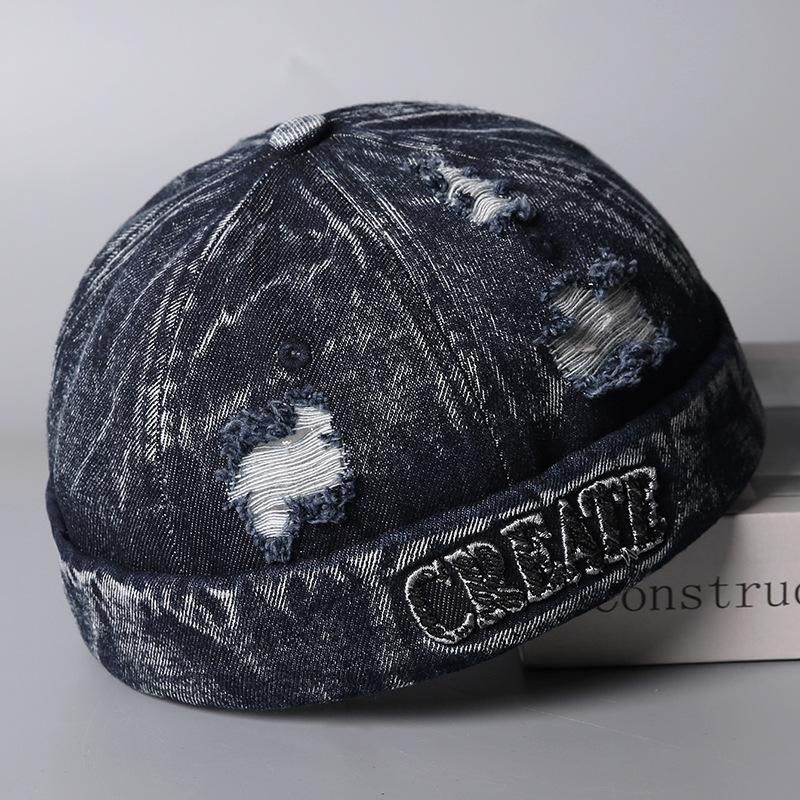 Europäische und amerikanische Stickbuchstaben zerrissene Jeans Melonenmütze Herren und Damen Paare Modetrend lässig vielseitig Vermieterhut