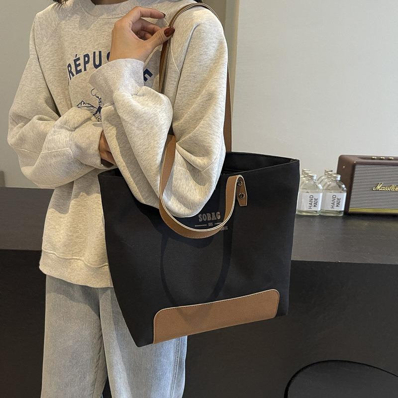 Original design simple high-end commuter canvas tote literary and casual versatile student portable shoulder bag