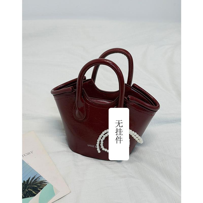 

Premium sense light luxury vegetable basket bag women 2025 new niche design portable bucket foreign gas shoulder bag красный