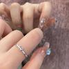 Women's Adjustable Love Zircon Ring: Simple Hollow Heart Design with Diamond Accents, Ideal for Fashion-Forward Girlfriend's Index Finger.