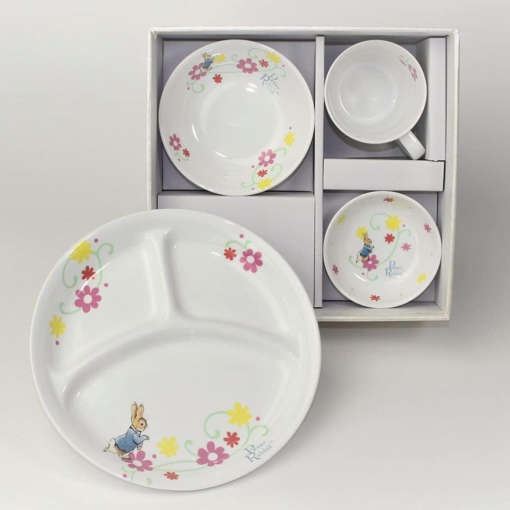 Ein Set Porzellan-Mittagessen klein tief und Mit Peter Rabbit und Fleur diese Mino-Keramikgeschirre sind für Kinder leicht zu essen und für Erwachsene zu Gemacht