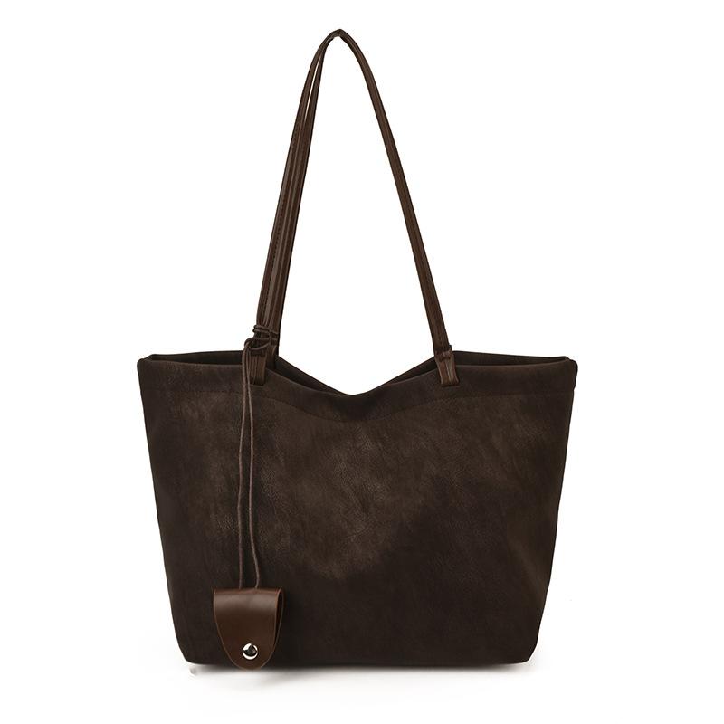 

Winter Korean version of underarm bag women s 2025 new work commuter tote bag retro large-capacity portable shoulder bag