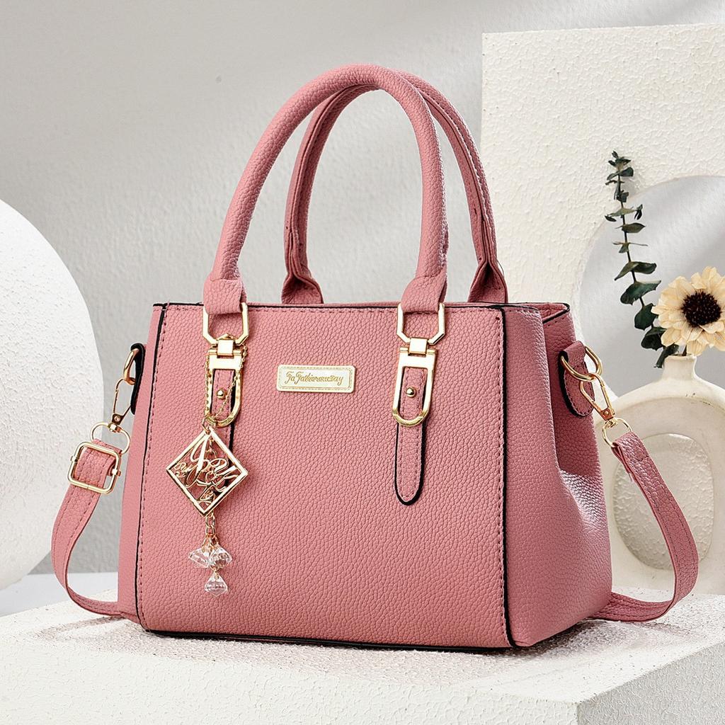 Simple and large-capacity hot-selling handheld women's bags 2026 new fashionable and versatile PU material single shoulder oblique span small