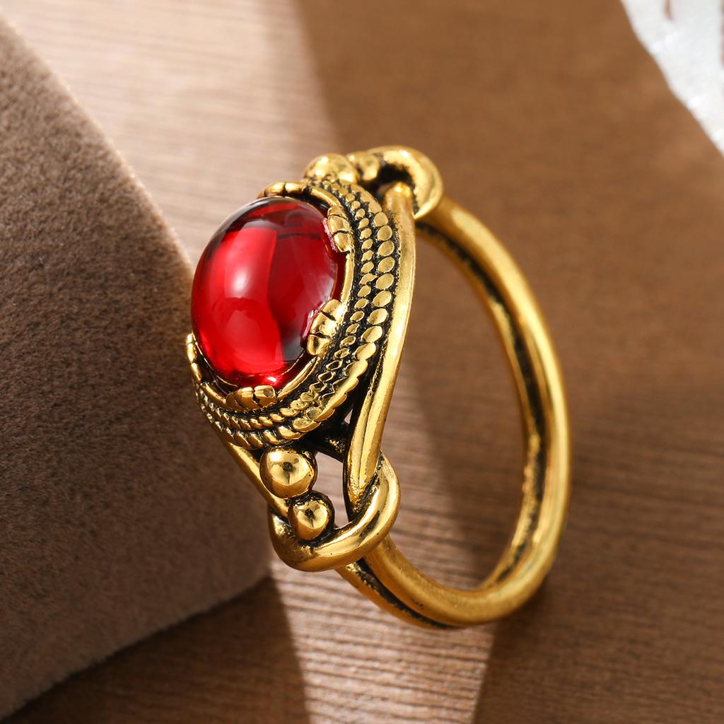 Retro-style coiled artificial gemstone ring made of copper for ladies' jewelry. Suitable for formal events and parties.