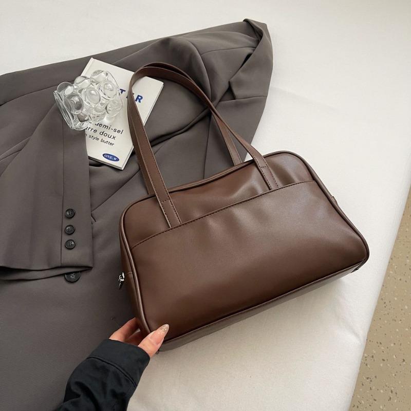 Simple bowling bag women's new large-capacity retro commuting design single shoulder pillow bag
