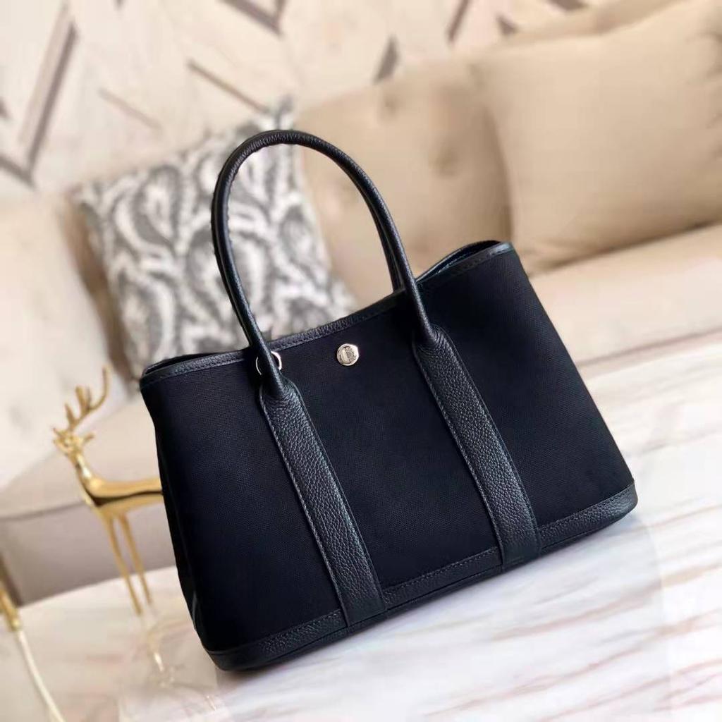 Grensoverschrijdende nieuwe canvas tas met eerste laag koeienhuid voor dames, tuin handtas, echt leer, contrasterende kleur, schoudertas, messenger tas, tote bag