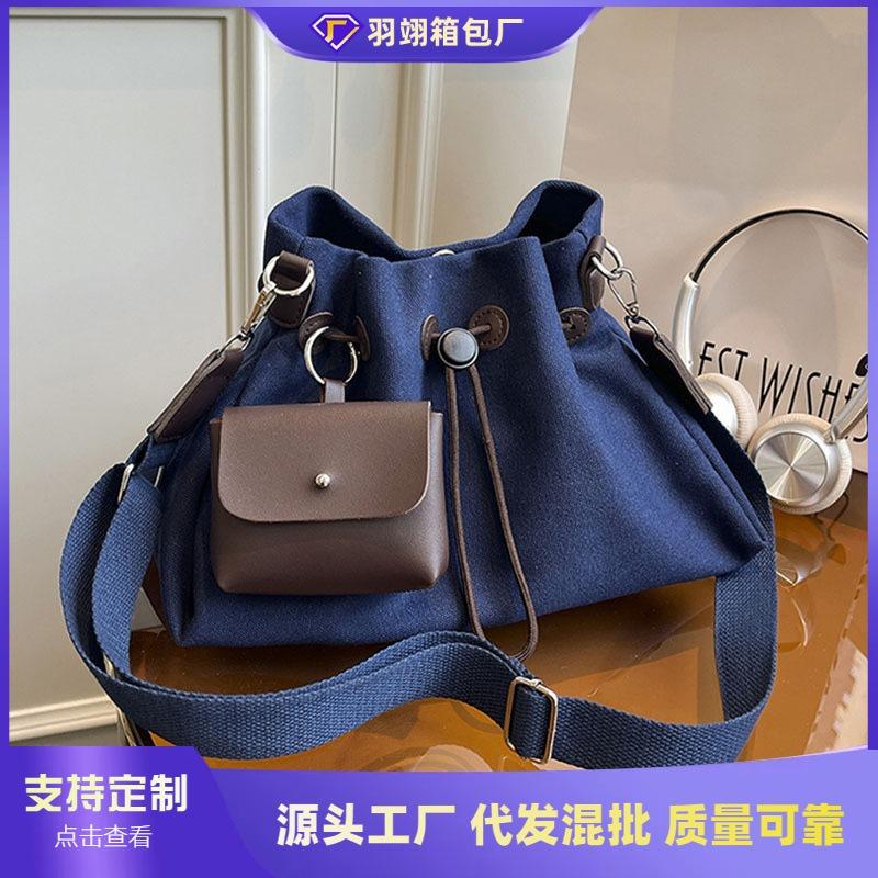 Canvas bag women's large-capacity new autumn and winter drawstring shoulder messenger bag premium pleated bucket bag