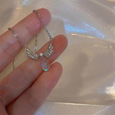 Angel's Wing Moonstone Necklace: Iridescent Fairy Style Clavicle Chain with Exquisite Small Wings for Women