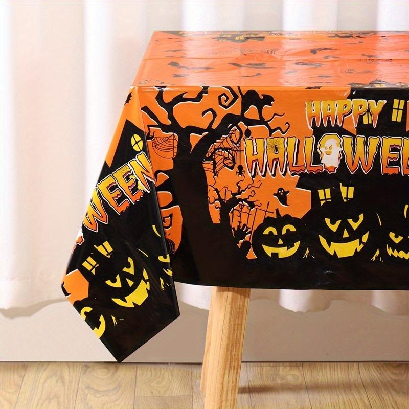 1 piece of happy Halloween plastic tablecloth - with patterns of castle, ghost, pumpkin and spider.PMJ
