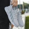 Neue Herrenschuhe beliebt große Größe atmungsaktiv Fly-Weben Mode lässig dicke Sohle leichtgewichtige Lauf-Sportschuhe trendige Schuhe
