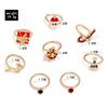 8-Piece European Christmas Rhinestone Ring Set: Tree, Santa, Bowtie & Reindeer Designs