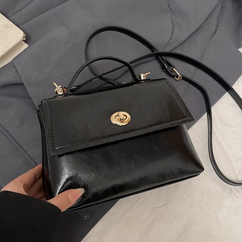 French simple high-end temperament oil wax leather portable small square bag women's commuting versatile solid color casual style messenger bag