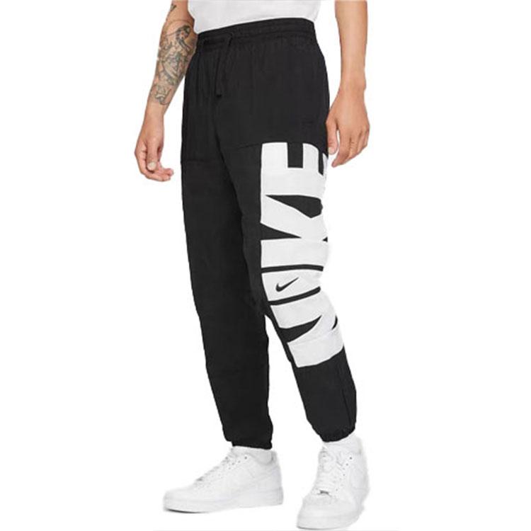 Nike Pantalón de chándal deportivo de entrenamiento con estampado de logotipo y malla transpirable para hombre Negro CW7352-010