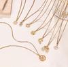 HOVANCI 18K Gold Plated Waterproof Hypoallergenic Dainty Stainless Steel Multi-Style Turtle Heart Flower Pendant Necklace