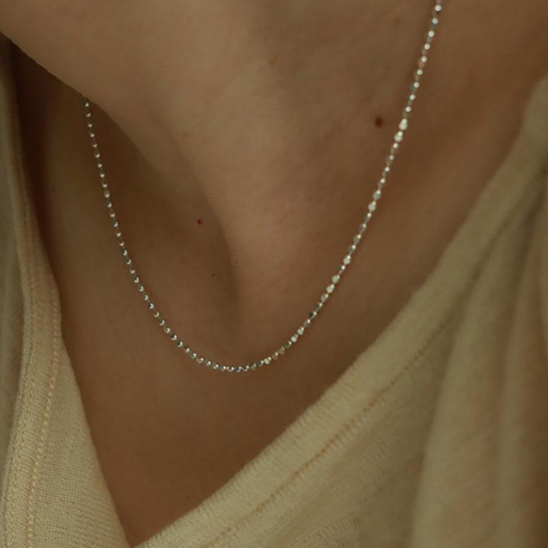 

Less is more silver cutting ball necklace free