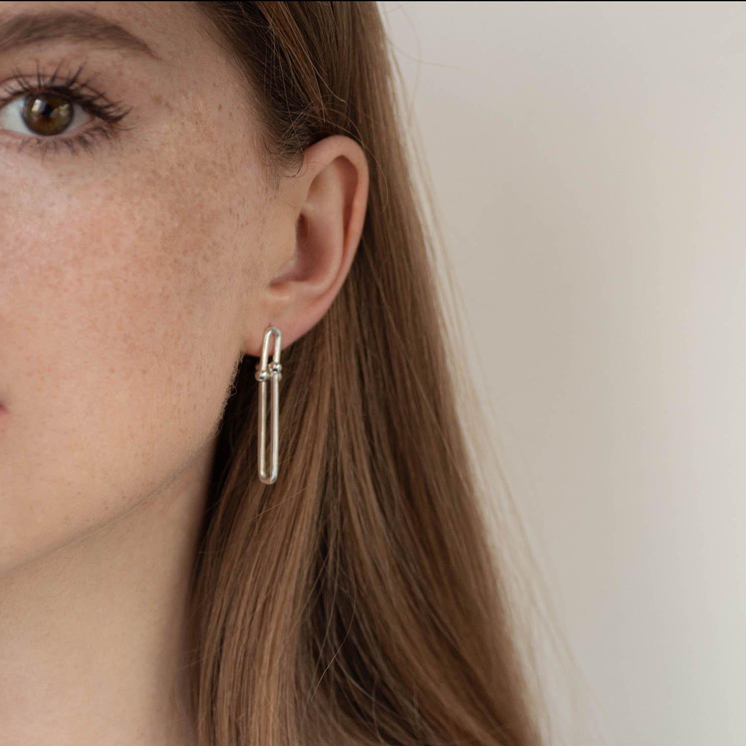 

Срібні сережки-підвіски Ідея Oniks срібний