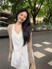 Women's Stylish V-Neck Sleeveless Summer Dress: Loose Fit, Slimming, Solid Color, Short Skirt - New Fashion Collection.