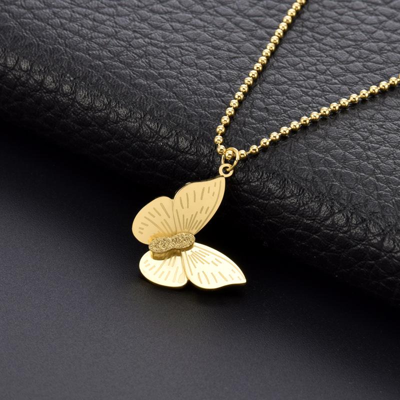 Elegant Gold Titanium Steel Women's Necklace with White Shell, Zircon, and Monogram Tassel
