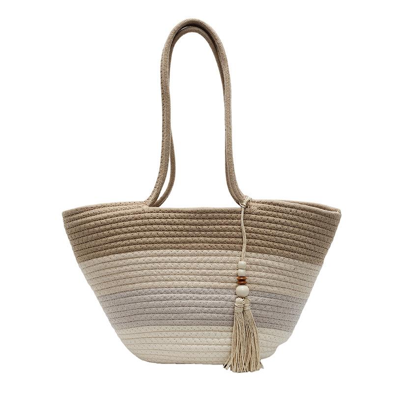 

Women s bag 25 spring new personalized woven stripes contrasting colors large capacity beach vacation shoulder armpit bag women хаки