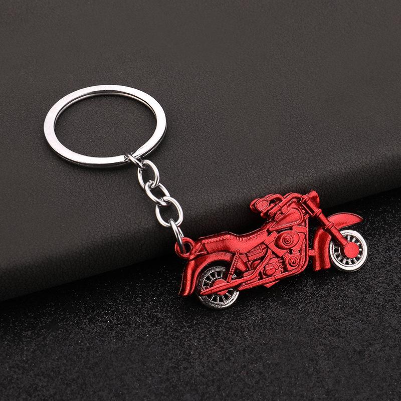 Klíčenka s motocyklovým kolem: Simulovaná pohyblivá ozdoba