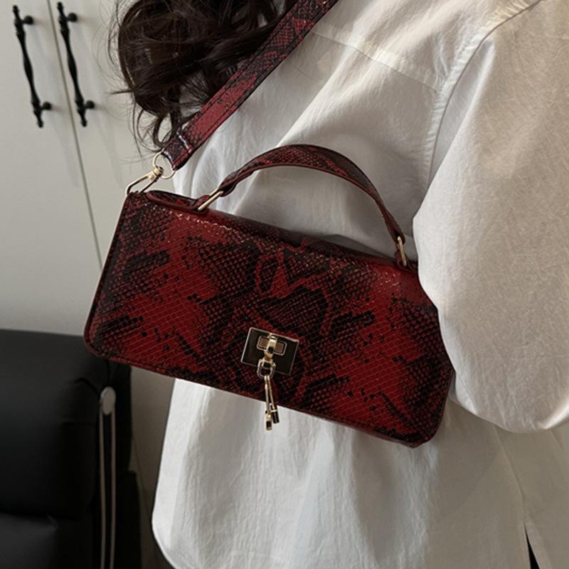Bolsa de mão de cor sólida tendência 2025, design de nicho, versátil, grande capacidade, bolsa de ombro transversal, com fecho, bolsa feminina de temperamento