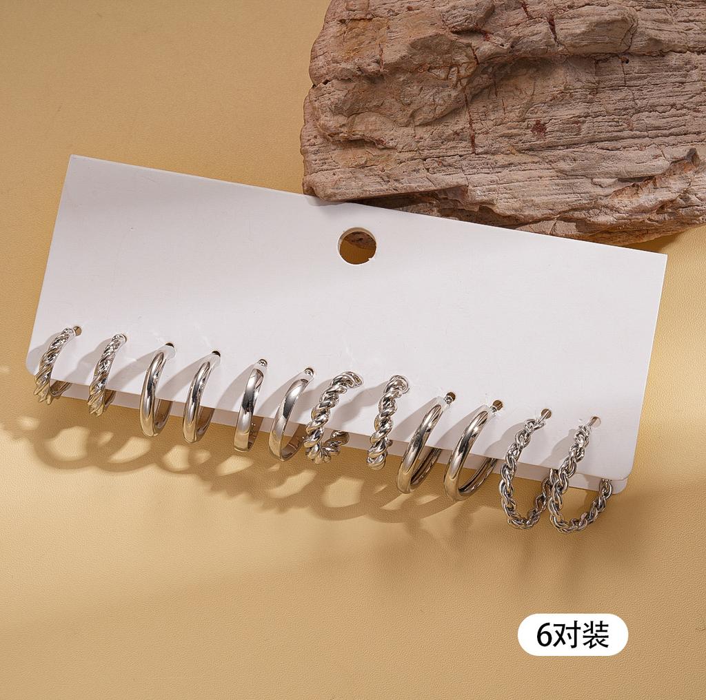 Twelve-piece geometric round twisted silver needle stud earrings fashionable commuter earrings