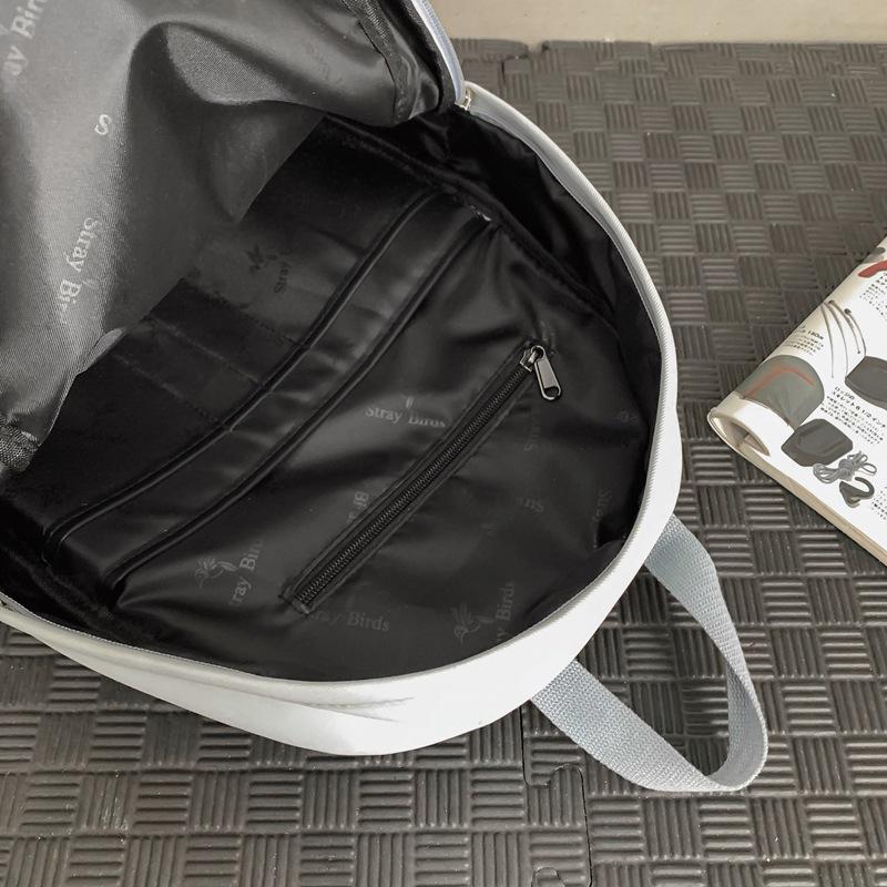 School bag 2025 new solid color simple backpack college student Korean version school bag versatile simple casual fashion backpack