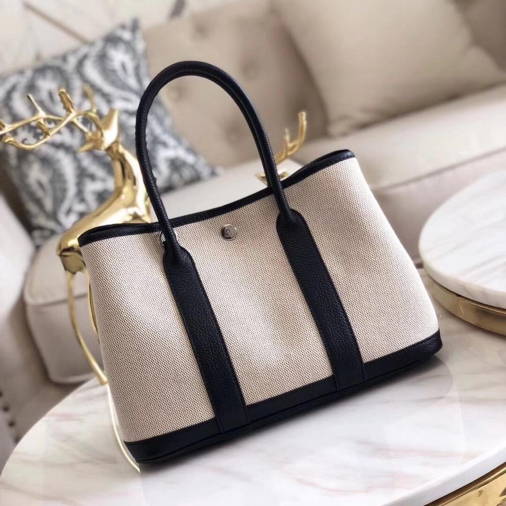 Grensoverschrijdende nieuwe canvas tas met eerste laag koeienhuid voor dames, tuin handtas, echt leer, contrasterende kleur, schoudertas, messenger tas, tote bag