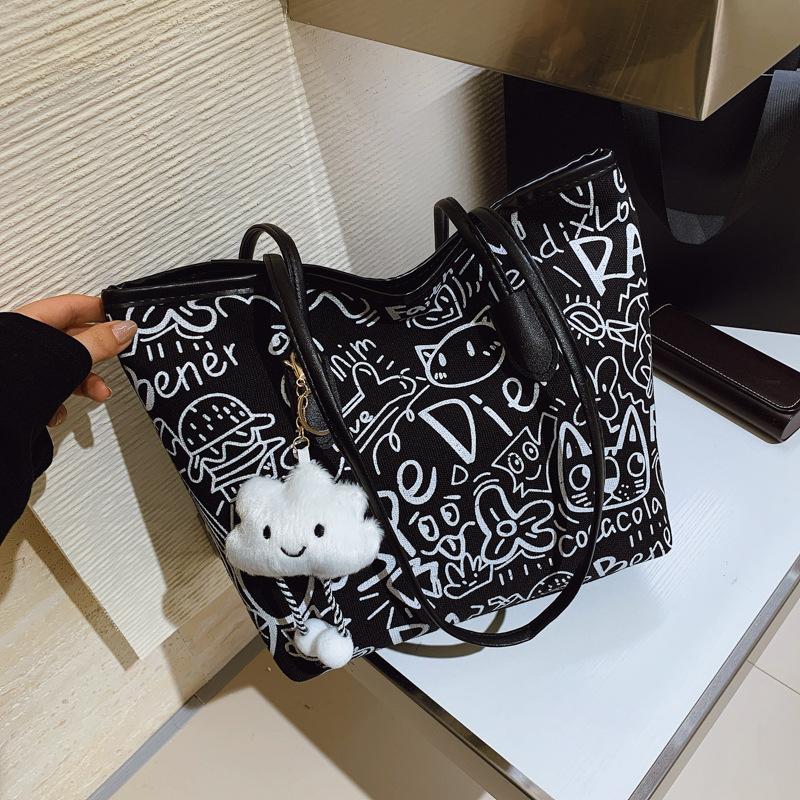 

Сумка-тоут с граффити, нишевый дизайн, ручная тканевая сумка, женская сумка, новая осенняя, повседневная на плечо, большой вместимости, сумка под мышку