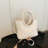 Urban Minimalist Creative Round Handheld Bag Large Capacity Tote Bag In Chic Brown Khaki White And Black Colors For Everyday Use