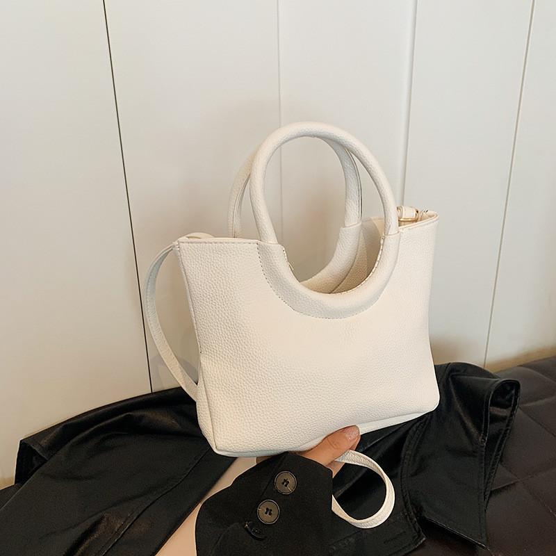Urban Minimalist Creative Round Handheld Bag Large Capacity Tote Bag In Chic Brown Khaki White And Black Colors For Everyday Use