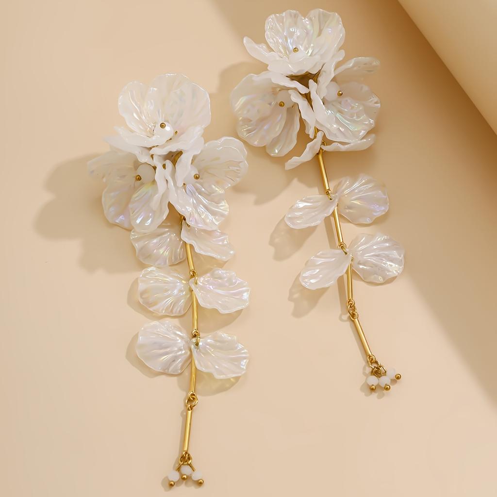 A pair of women's long earrings in bohemian style, made of acrylic with iridescent shells, flowers, and crystals, suitable as a holiday gift