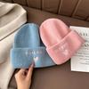 Korean Style Embroidered Knit Beanie: Warm Wool Hat with Ear Protection for Women, Trendy Small-Face Design, Perfect for Autumn and Winter Outdoors.