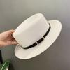 Spring and summer sunshade sunscreen straw hat women's fashion versatile belt buckle top hat British retro style small brim flat top hat