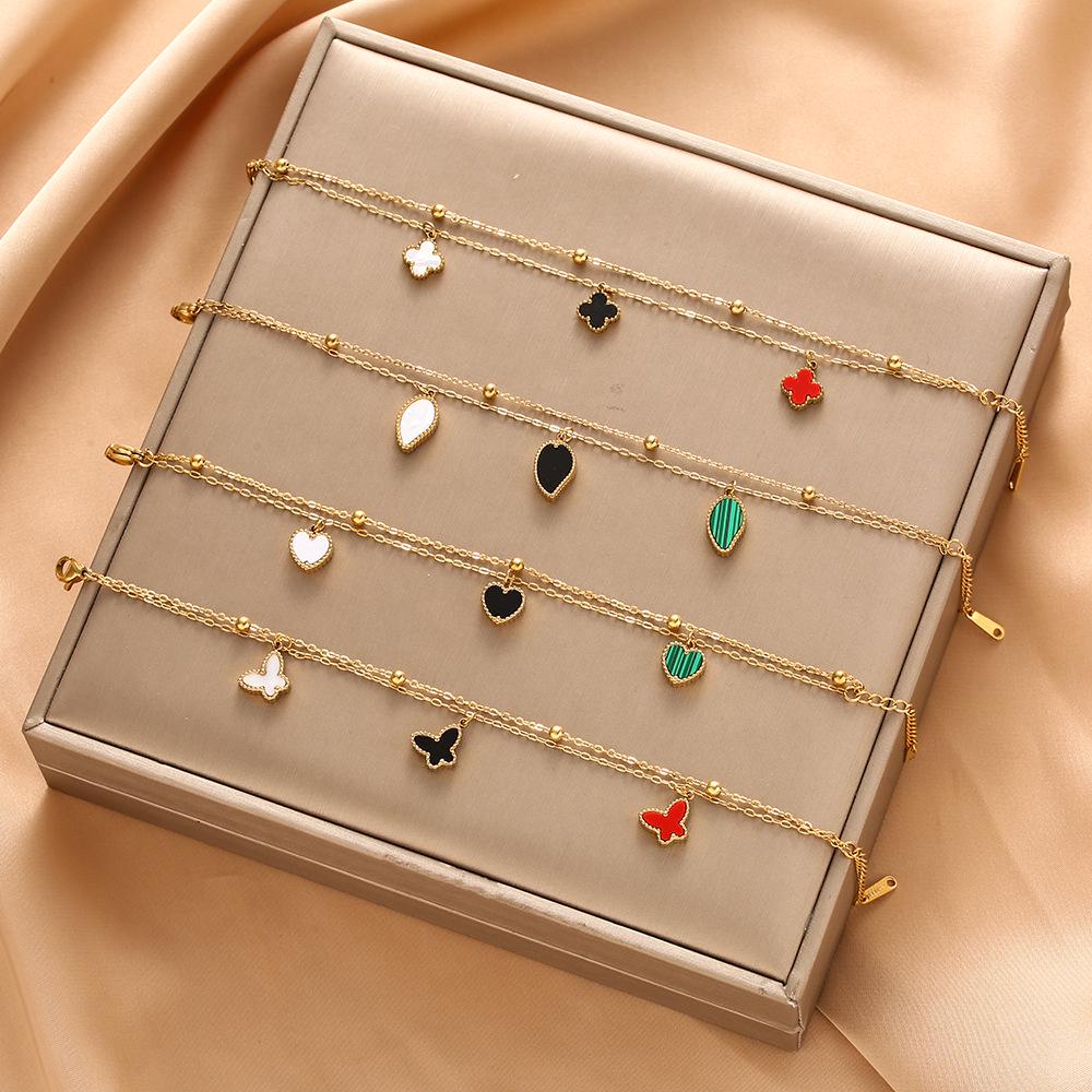 High-End Titanium Steel Four-Leaf Clover Bracelet with Shell Pendant – Durable, Fade-Resistant Design