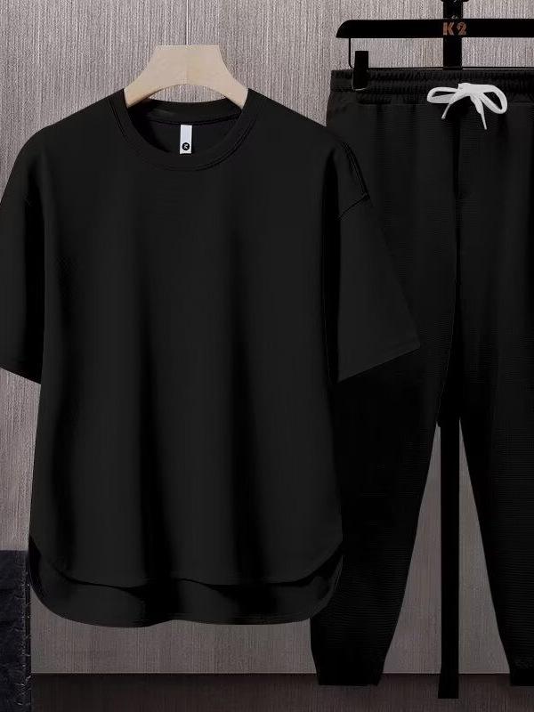 Set da uomo a due pezzi tinta unita tendenza giapponese: T-shirt a maniche corte e pantaloni lunghi (Estate 2025)