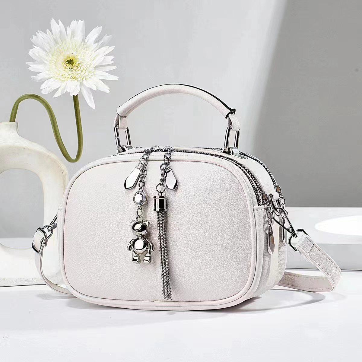 

Абсолютно новые модные женские сумки через плечо, кожаная женская сумка с кисточкой и подвеской, маленькая квадратная сумка, женские ручные сумки