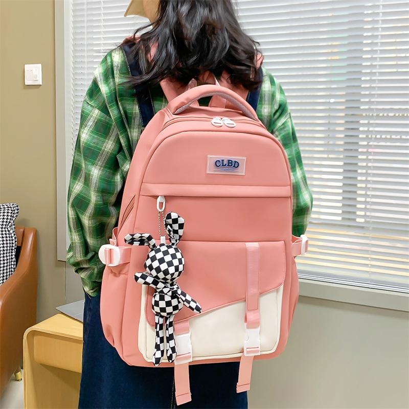 Small fresh color matching and labeling student schoolbag Korean version large-capacity junior high school backpack