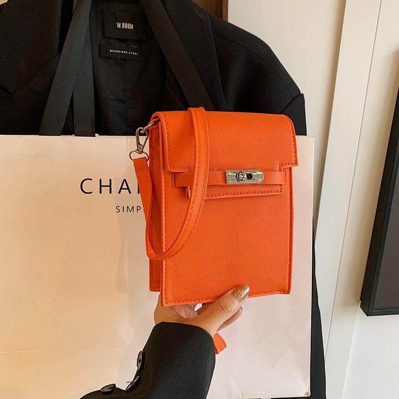 

Casual foreign style 2025 lock new European and American fashion women s solid color light luxury single shoulder oblique span mobile phone vertical оранжевый