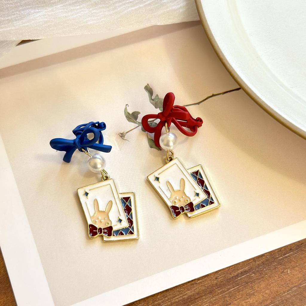 Asymmetrical Poker Rabbit Bowknot Earrings with Silver Needle Stud and No-Pierce Clip.