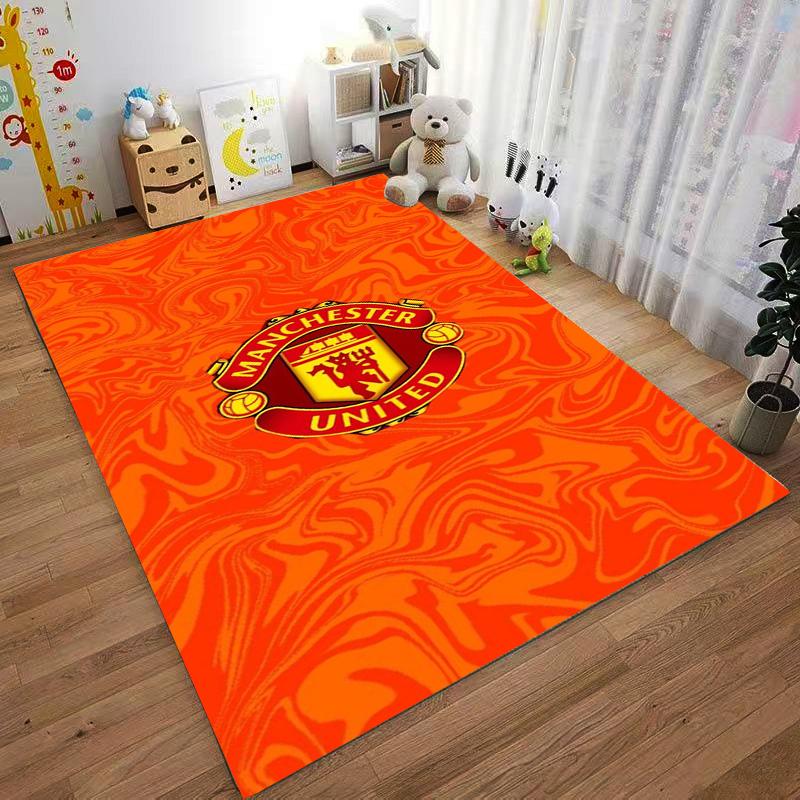 Manchester United Logo Carpet with Bold Orange Swirl Pattern Design Suitable for Use As an Anti-slip for Living Room Bedroom Sofas