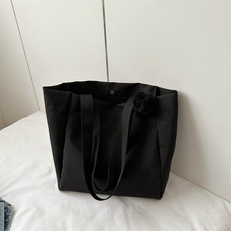 Bag women's new solid color large-capacity canvas shoulder bag simple commuter student tote bag shopping bag tide