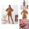 Elegante Tuta da Donna con Stampa Floreale Senza Schiena per Look Estivi Chic